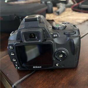 Nikon D40x with 18 - 55mm lens and full battery pack